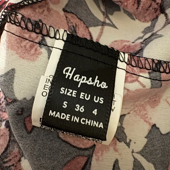 Black Floral Wrap Romper with Pink and Cream Blooms - Picture 5 of 5